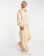 Mountain Explorer neoprene track pants in beige - Image 2