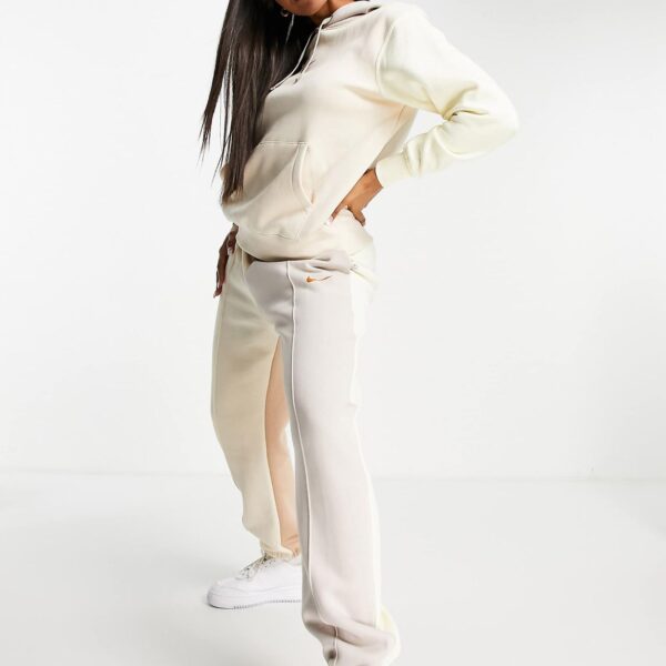 Nike Metallic Swoosh colour block joggers in cream and grey neutrals