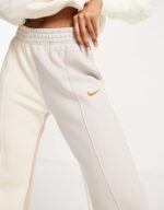 Nike Metallic Swoosh colour block joggers in cream and grey neutrals - Image 4