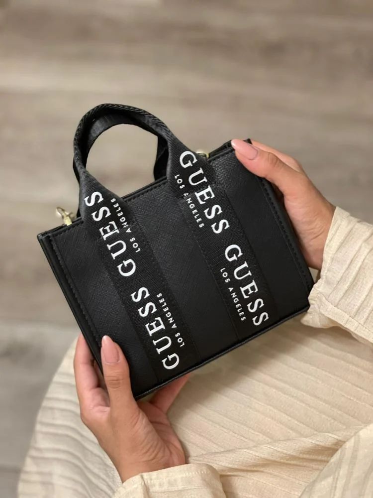 WhatsApp Image 2025-05-30 at 19.42.36_17159007 GUESS Logo-Tape Mini Tote Crossbody - Image 1