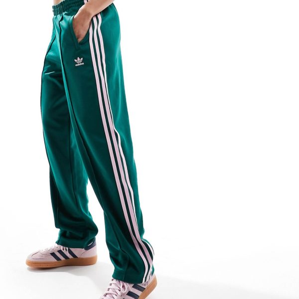 Adidas Originals Superstar track pants in green and pink