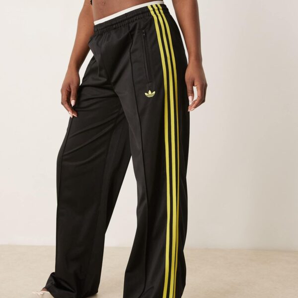 Firebird Loose track pants in black and light green